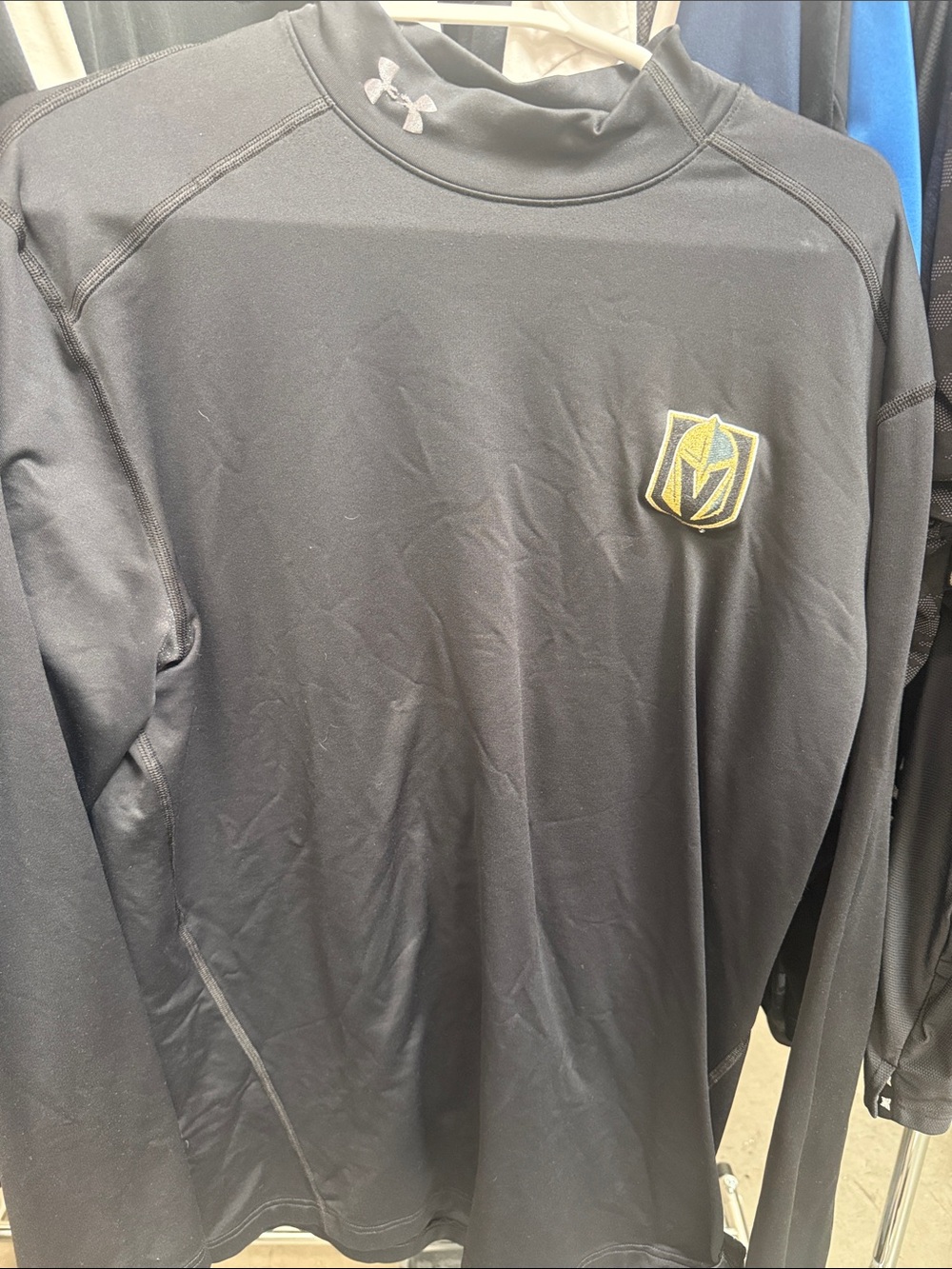 Under Armour Black Long Sleeve Performance Top with Gold Logo